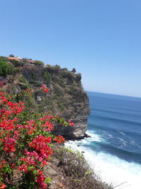 Scenic view of sea against clear blue sky