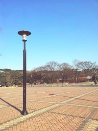 Street light against clear sky