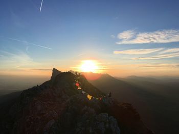 Scenic view of mountains against sky during sunset