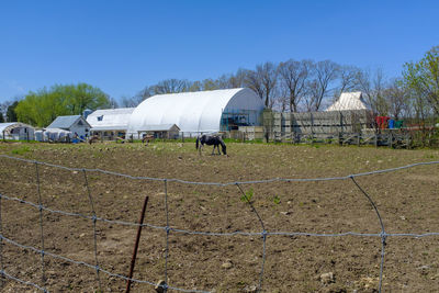 View of building on field against the sky