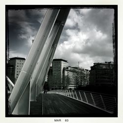 View of city against cloudy sky