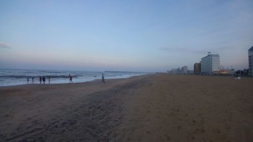 View of beach against sky during sunset