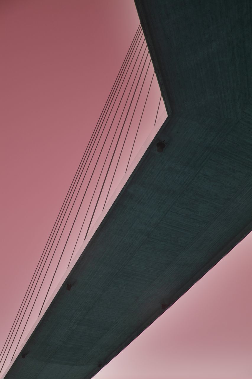 LOW ANGLE VIEW OF BRIDGE AGAINST SKY