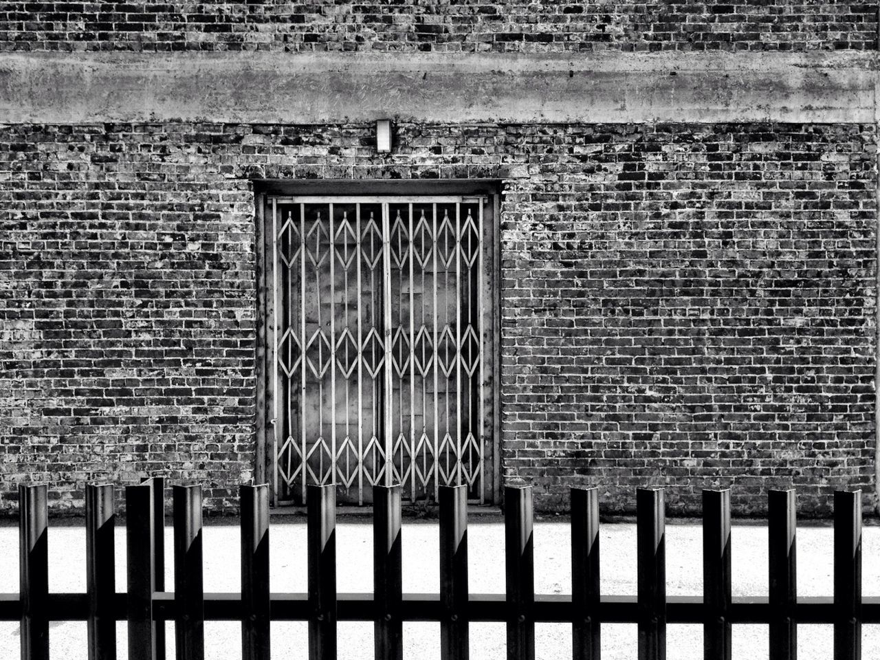built structure, building exterior, architecture, window, brick wall, protection, full frame, pattern, closed, safety, wall - building feature, backgrounds, security, fence, outdoors, day, house, no people, wall, metal