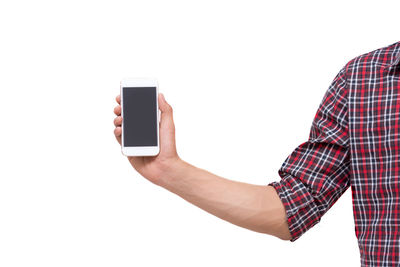 Low angle view of person using smart phone against white background