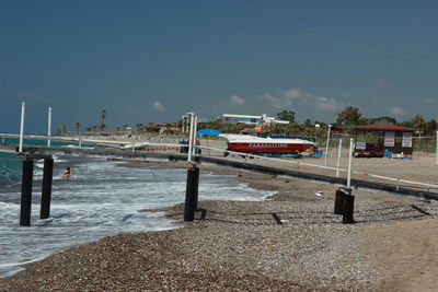 Scenic view of beach against clear sky