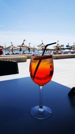 Close-up of wineglass on table