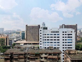 High angle view of buildings against sky