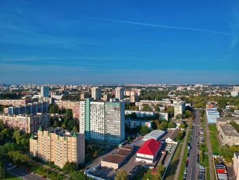 High angle view of buildings in city against sky