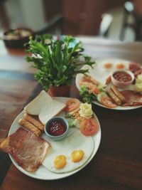 Close-up of breakfast served on table