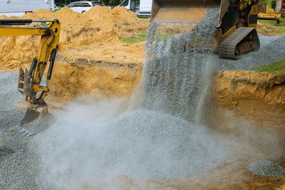 Water flowing through rocks at construction site