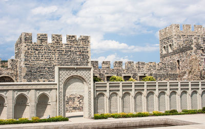 Fortress against cloudy sky