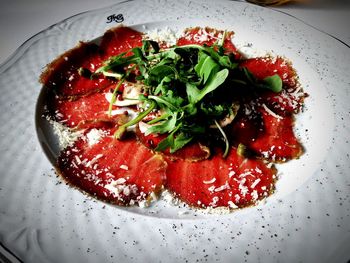 High angle view of strawberries in plate