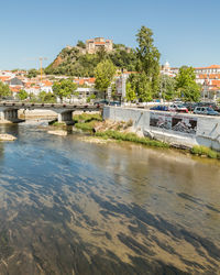 Scenic view of town against clear sky