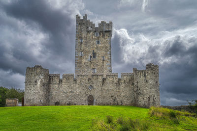 Old ruin building against cloudy sky