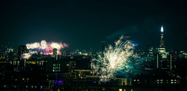 Firework display at night