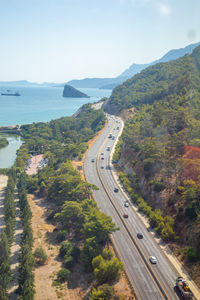 High angle view of road by sea against sky