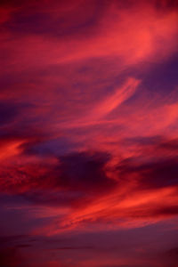 Low angle view of dramatic sky during sunset