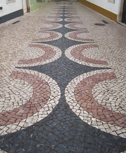 High angle view of text on footpath