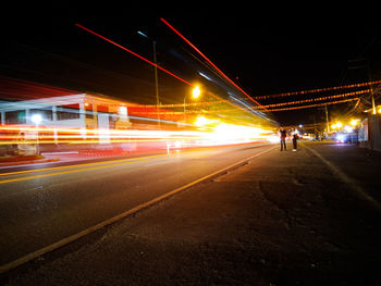 Light trails on road at night