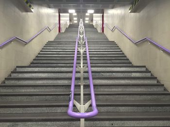 Low angle view of illuminated steps at subway station