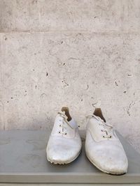 High angle view of shoes on wall