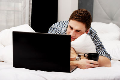 Young man using mobile phone