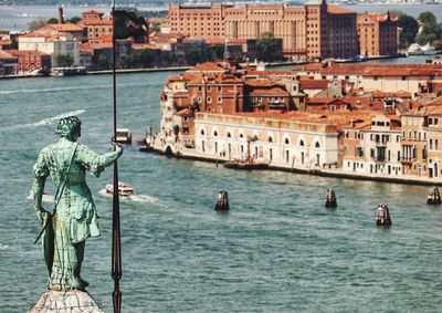 View of buildings in city at waterfront
