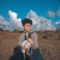 Holding a goat