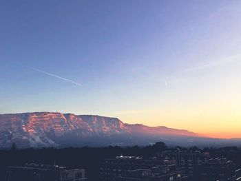 Scenic view of mountains against sky during sunset