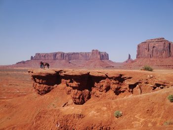 View of desert against clear sky