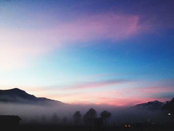 Scenic view of mountains at sunset