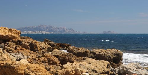 Scenic view of sea against clear blue sky