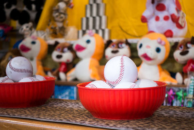 Close-up of toys for sale at market stall