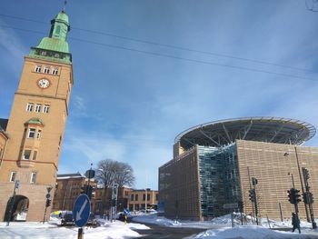 City against sky during winter