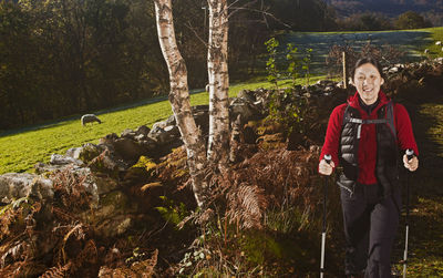 Mature female hiker on walking path in north wales