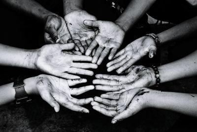 Midsection of hands