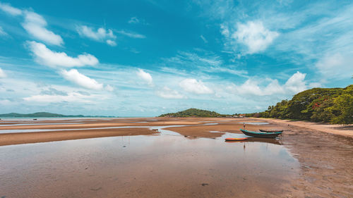 Scenic view of beach against sky