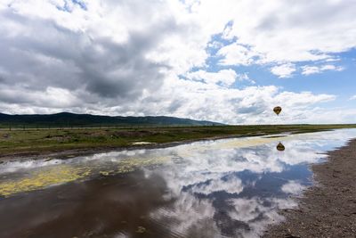 Scenic view of land against sky