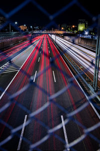 High angle view of light trails on street at night