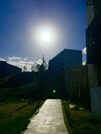 Sun shining through building