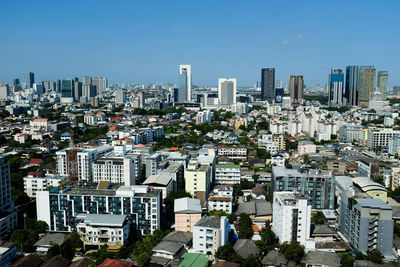 High angle view of buildings in city against clear sky