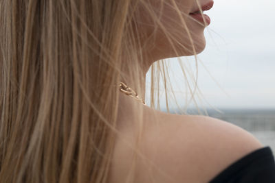 Close-up of woman wearing hat