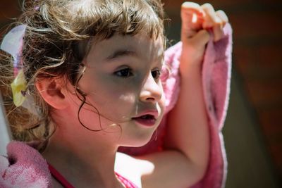 Close-up portrait of a girl looking away