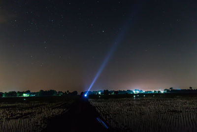 Scenic view of sky over land at night