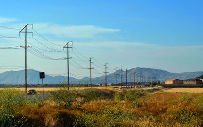 Electric pylon against sky