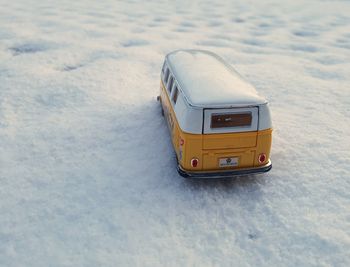 High angle view of car on snow covered land