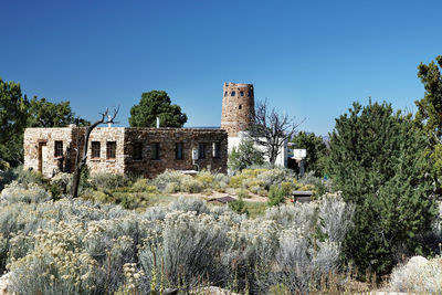 Old building against clear blue sky