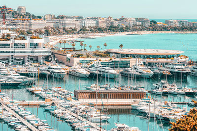 Aerial view of luxurious yachts and boats in cannes harbor port at mediterranean sea