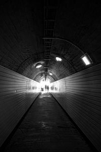 Underground walkway at night